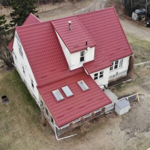 Red metal tile roof.