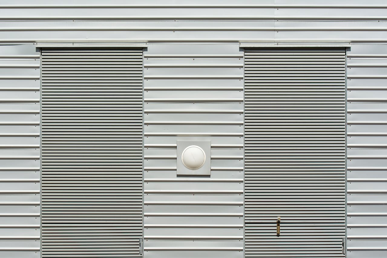 Roller blinds on a house building